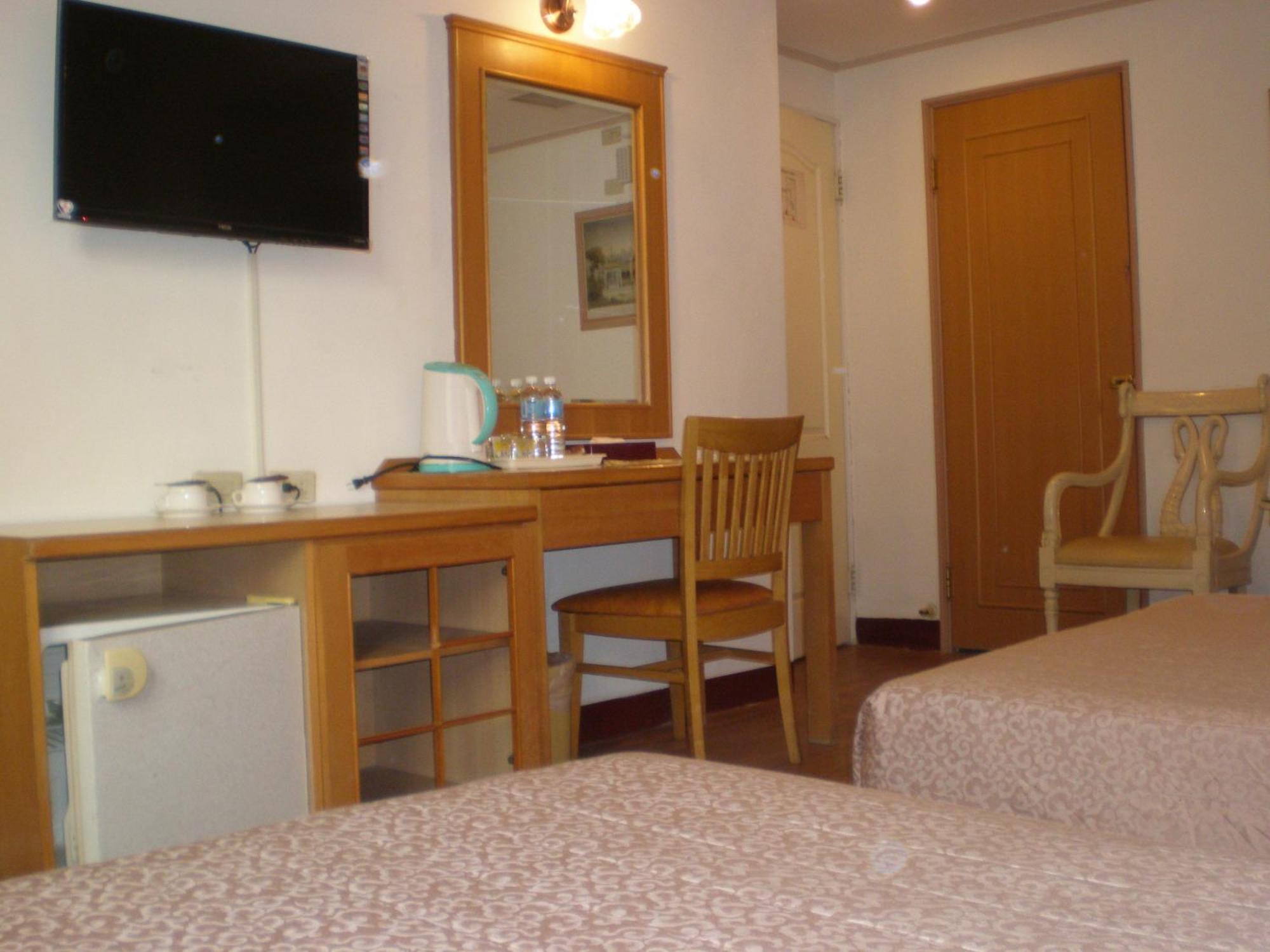 Riverside Hotel Kaohsiung Rom bilde